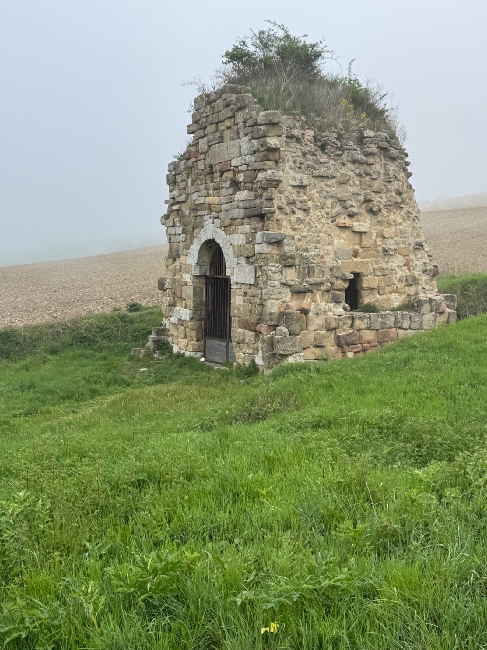 Ruined stone chapel in Castilian countryside