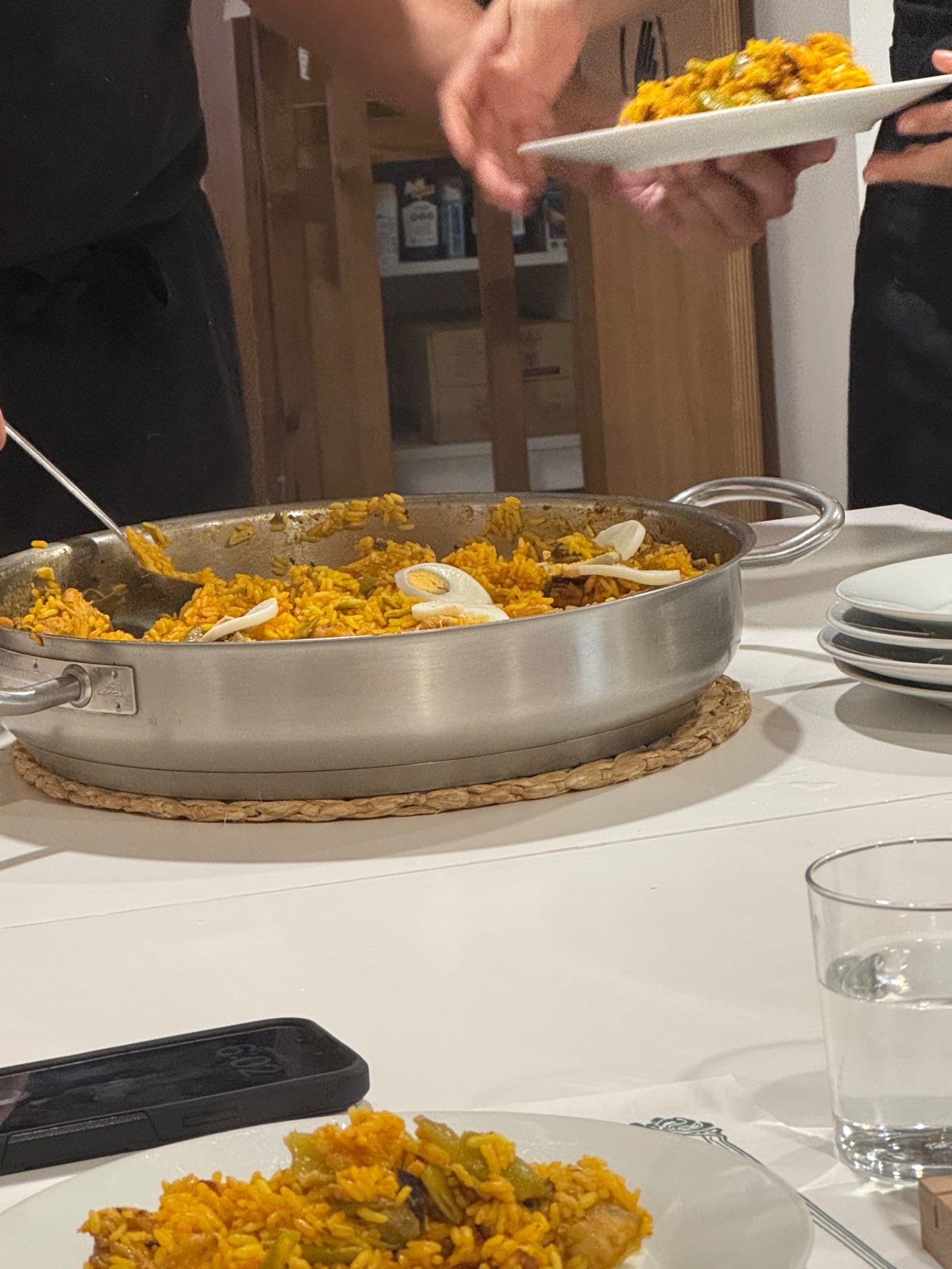 Traditional paella being served at pilgrims dinner