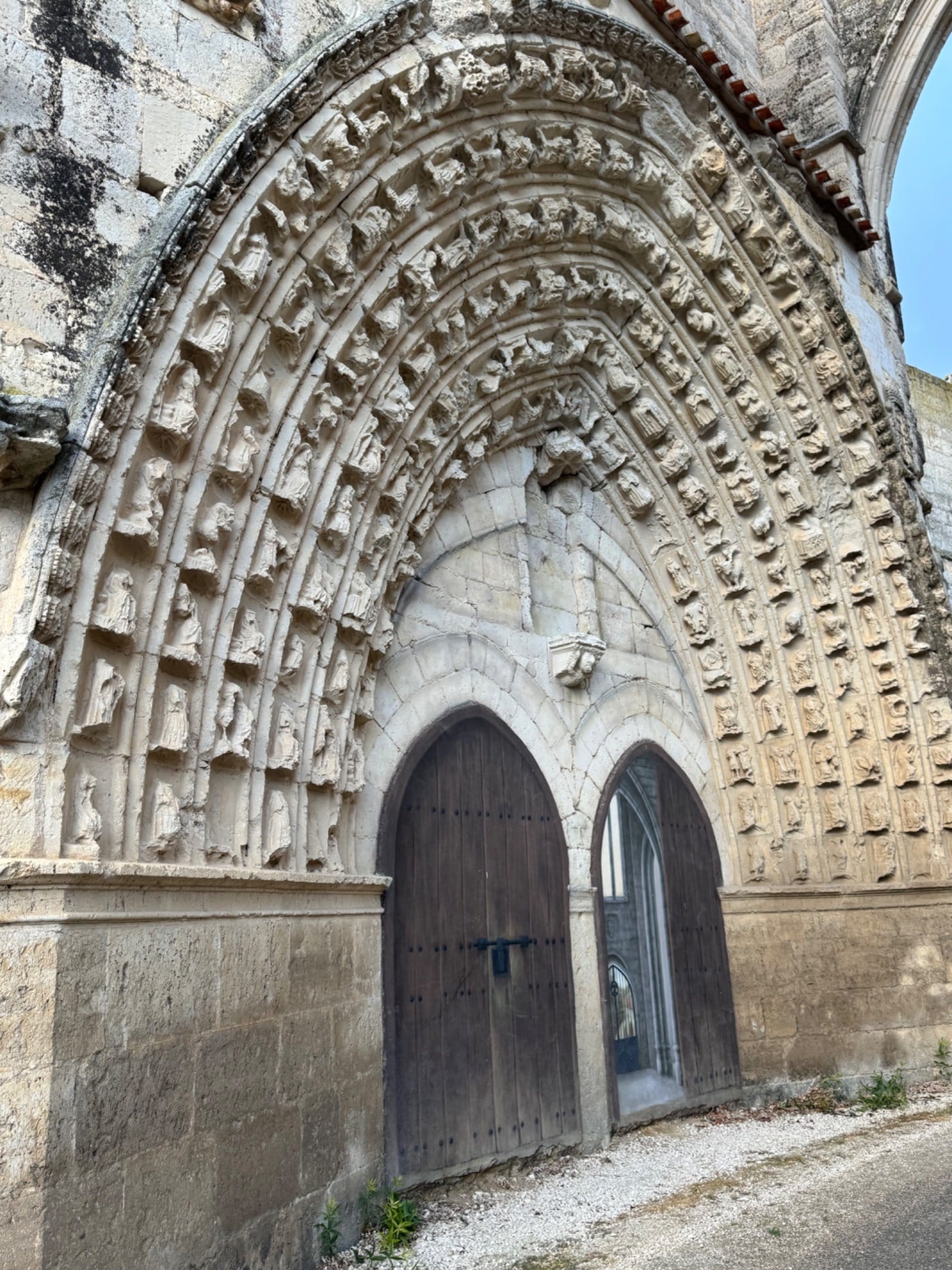 Ornate Romanesque church doorway in Fromista