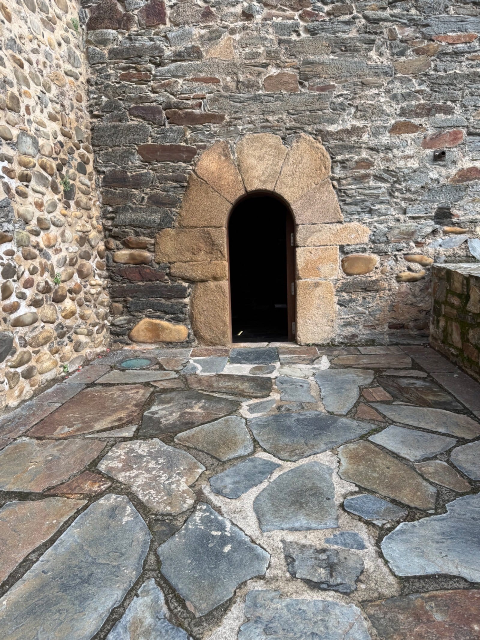 Arched stone doorway inside the castle walls