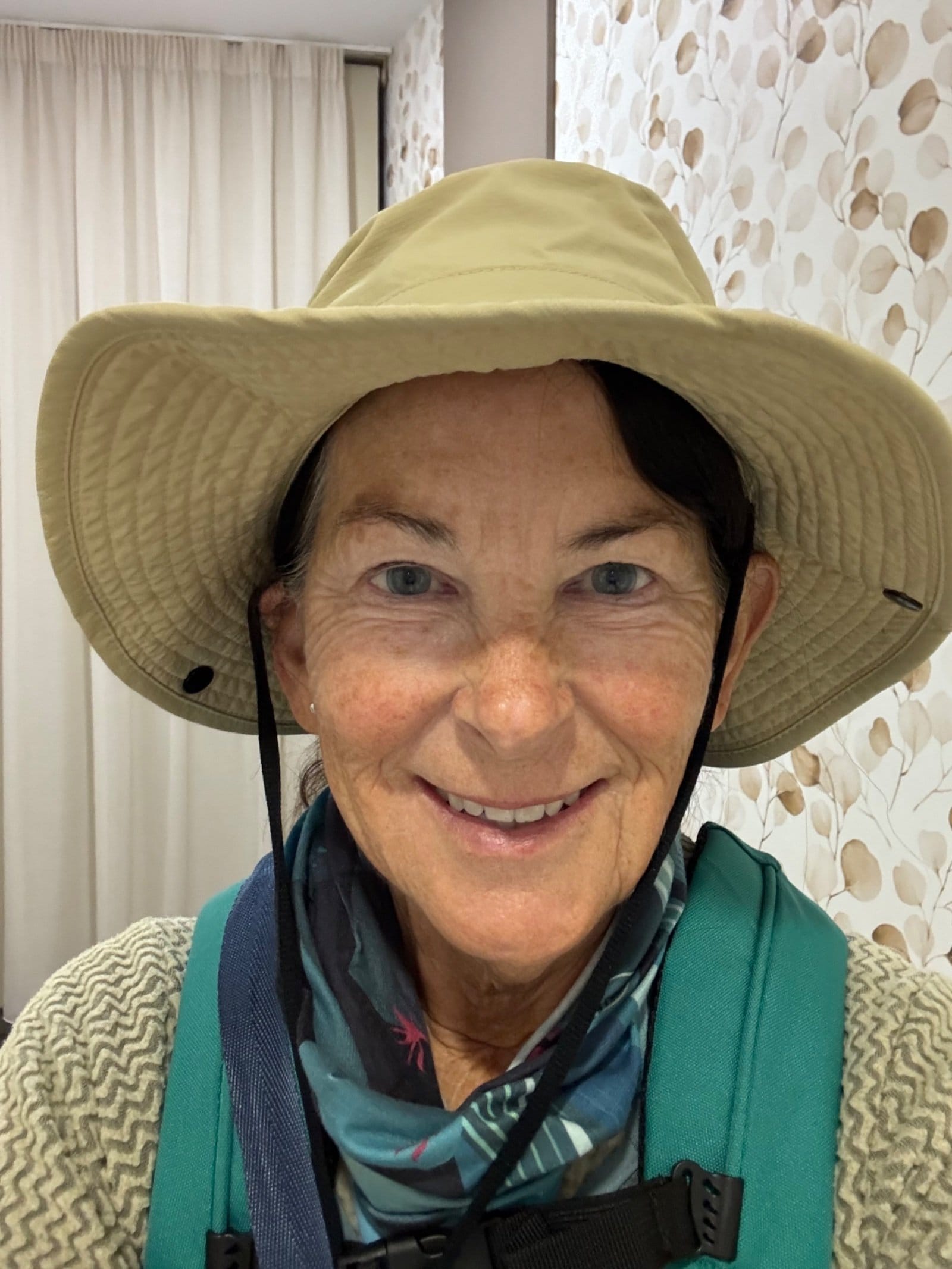 Happy pilgrim in Santiago hotel room