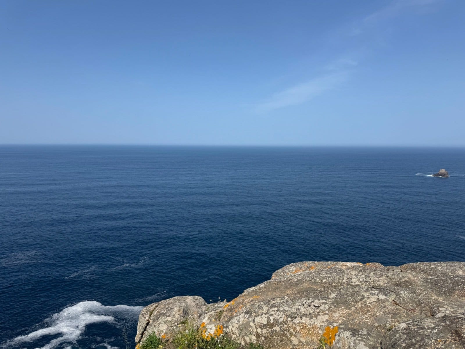 Atlantic horizon view from Finisterre lighthouse clifftop