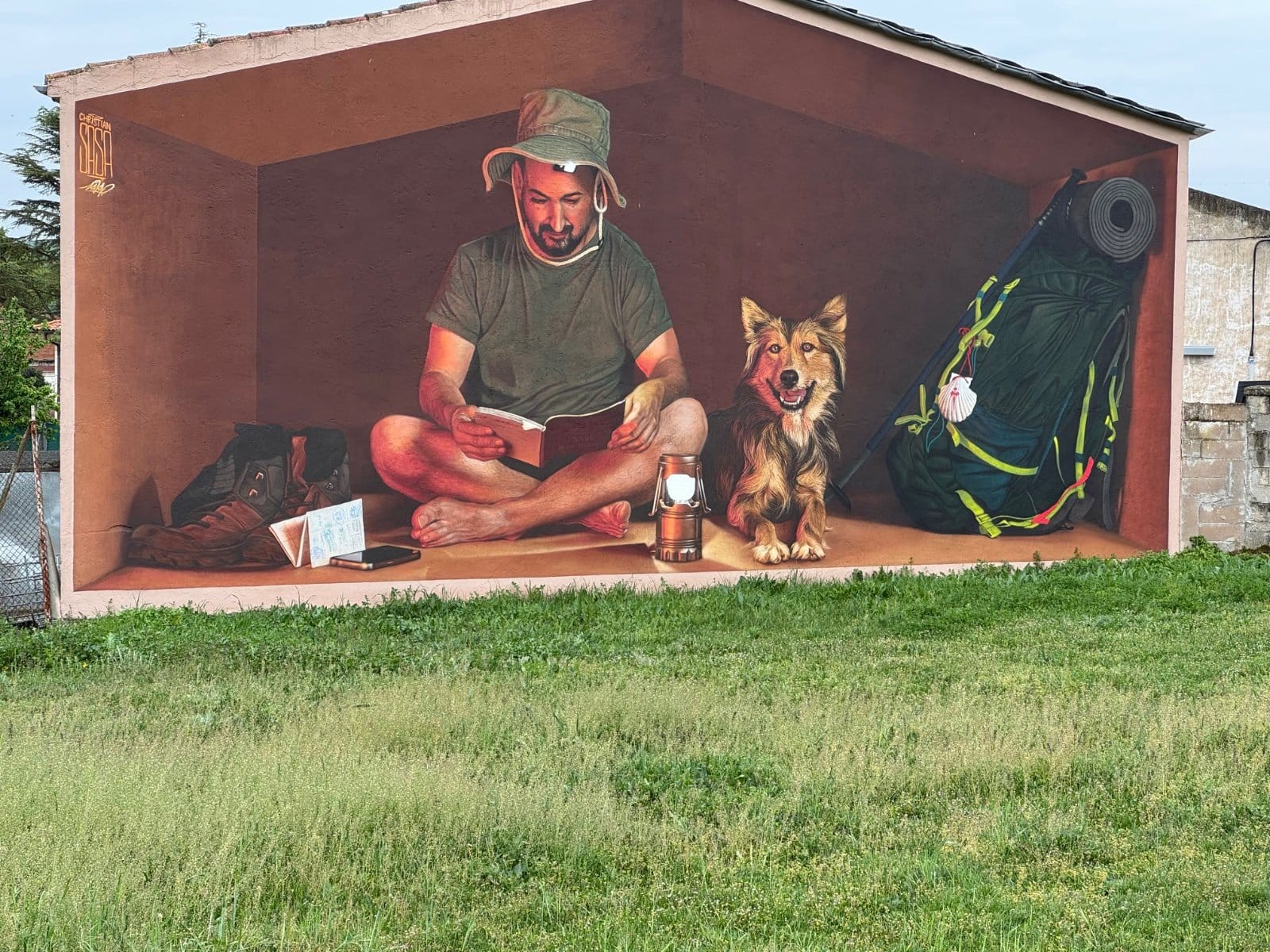 Pilgrim and dog scene with backpack and lantern