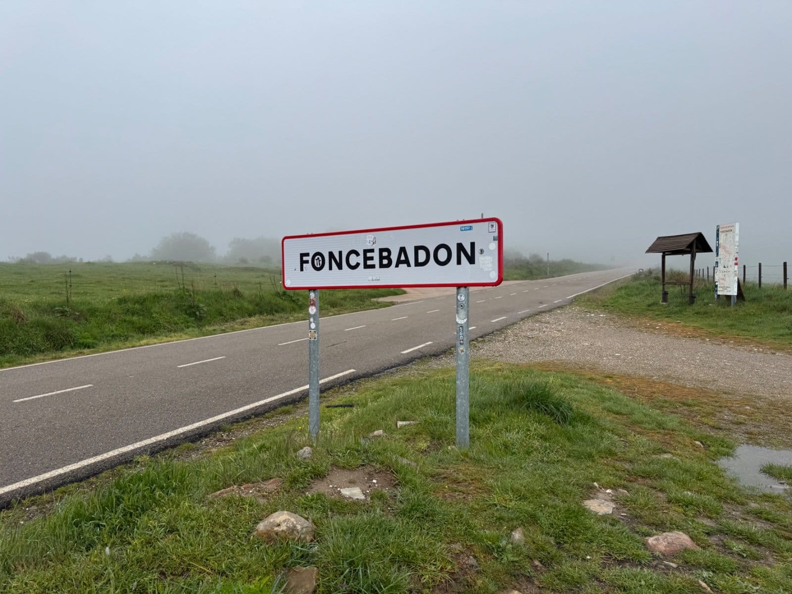 Foncebadón village sign in misty weather
