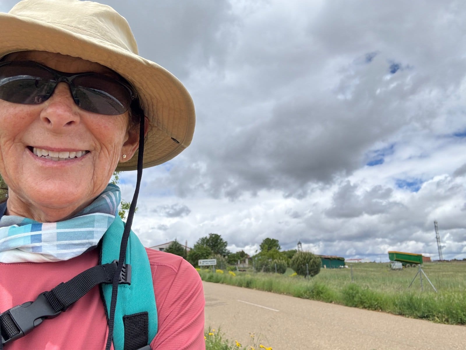 Pilgrim on cool, cloudy day in Meseta countryside