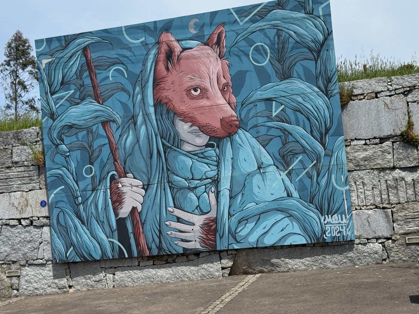 Wolf-headed pilgrim with walking stick artwork