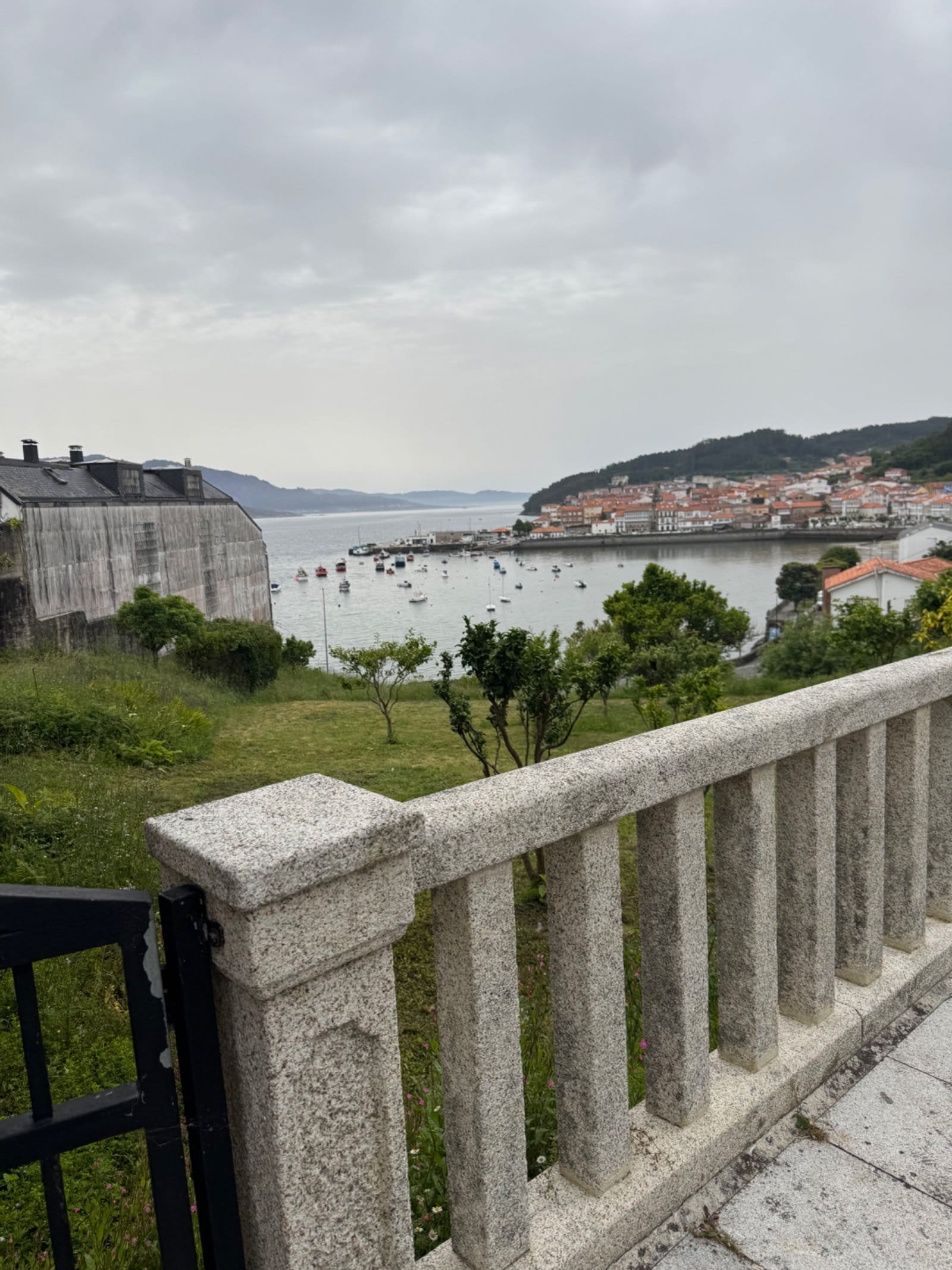View over Finisterre town from hillside approach
