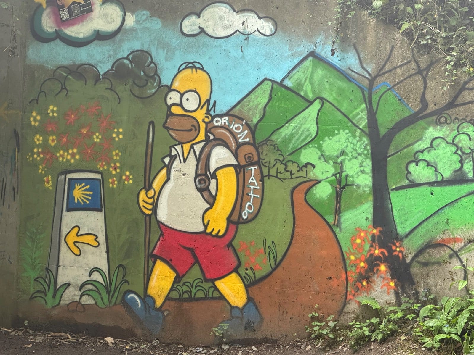 Homer Simpson as Camino pilgrim cartoon mural