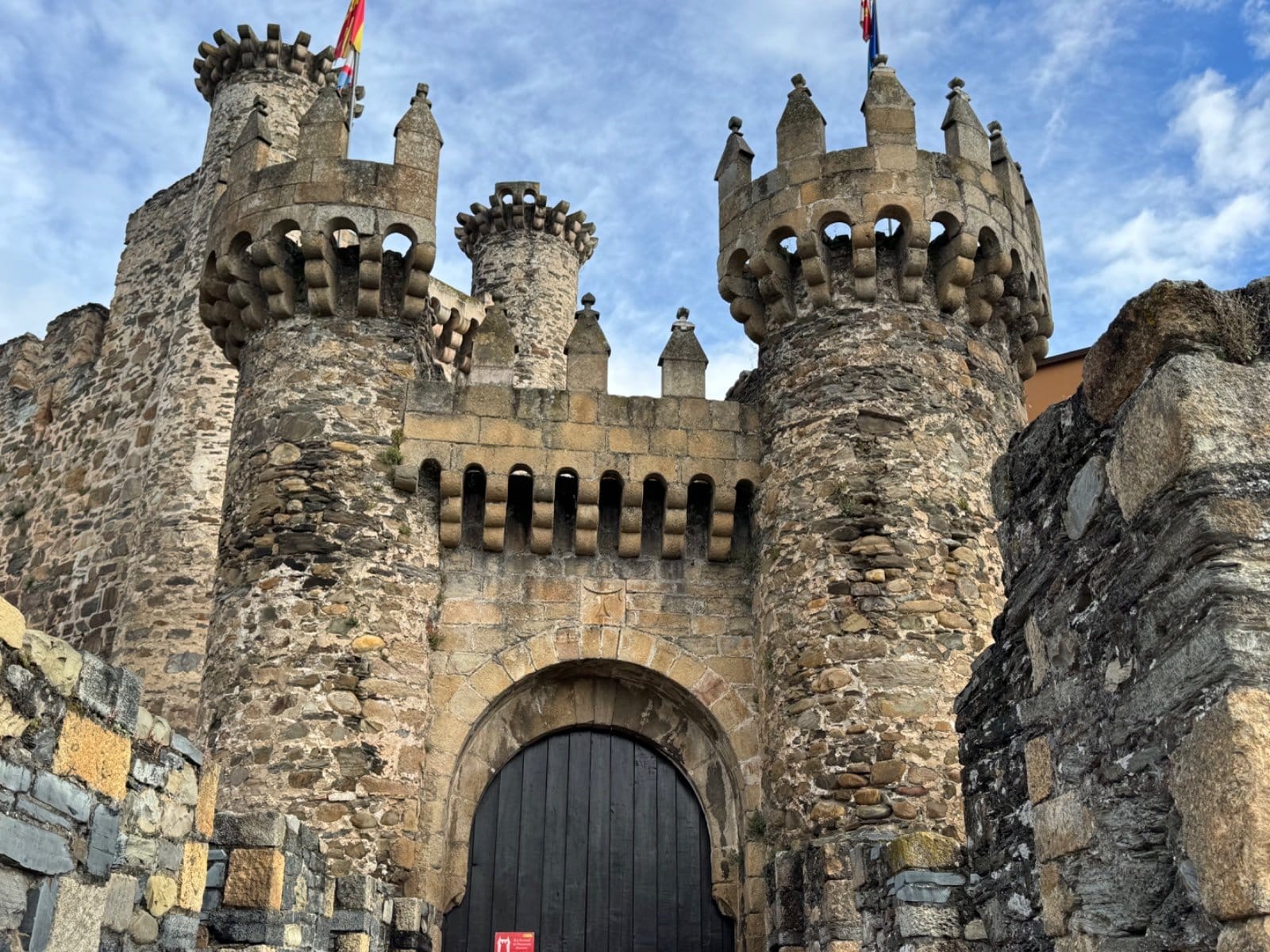 Twin towers flanking castle entrance in Ponferrada