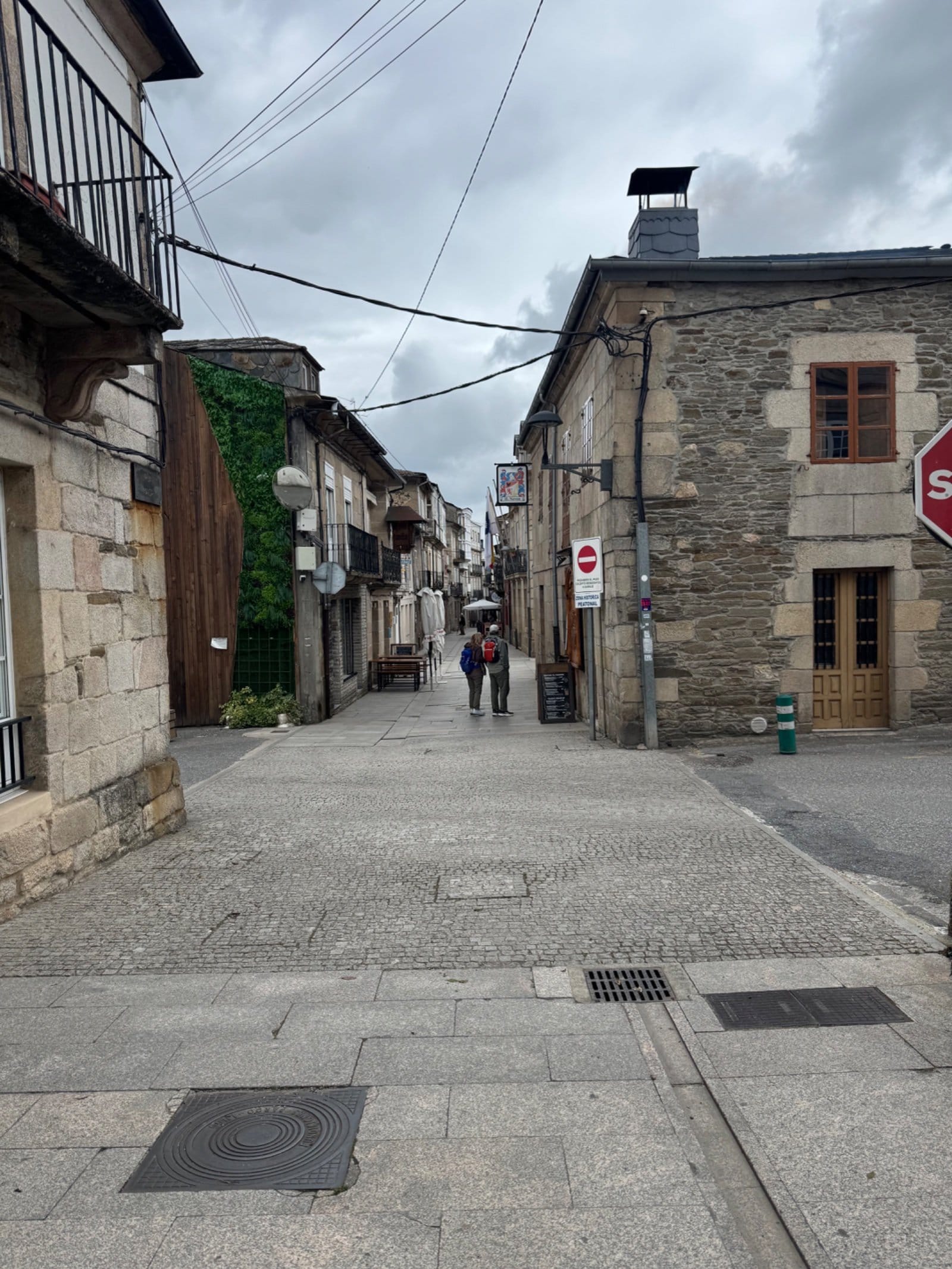 Stone-paved street in historic Sarria center