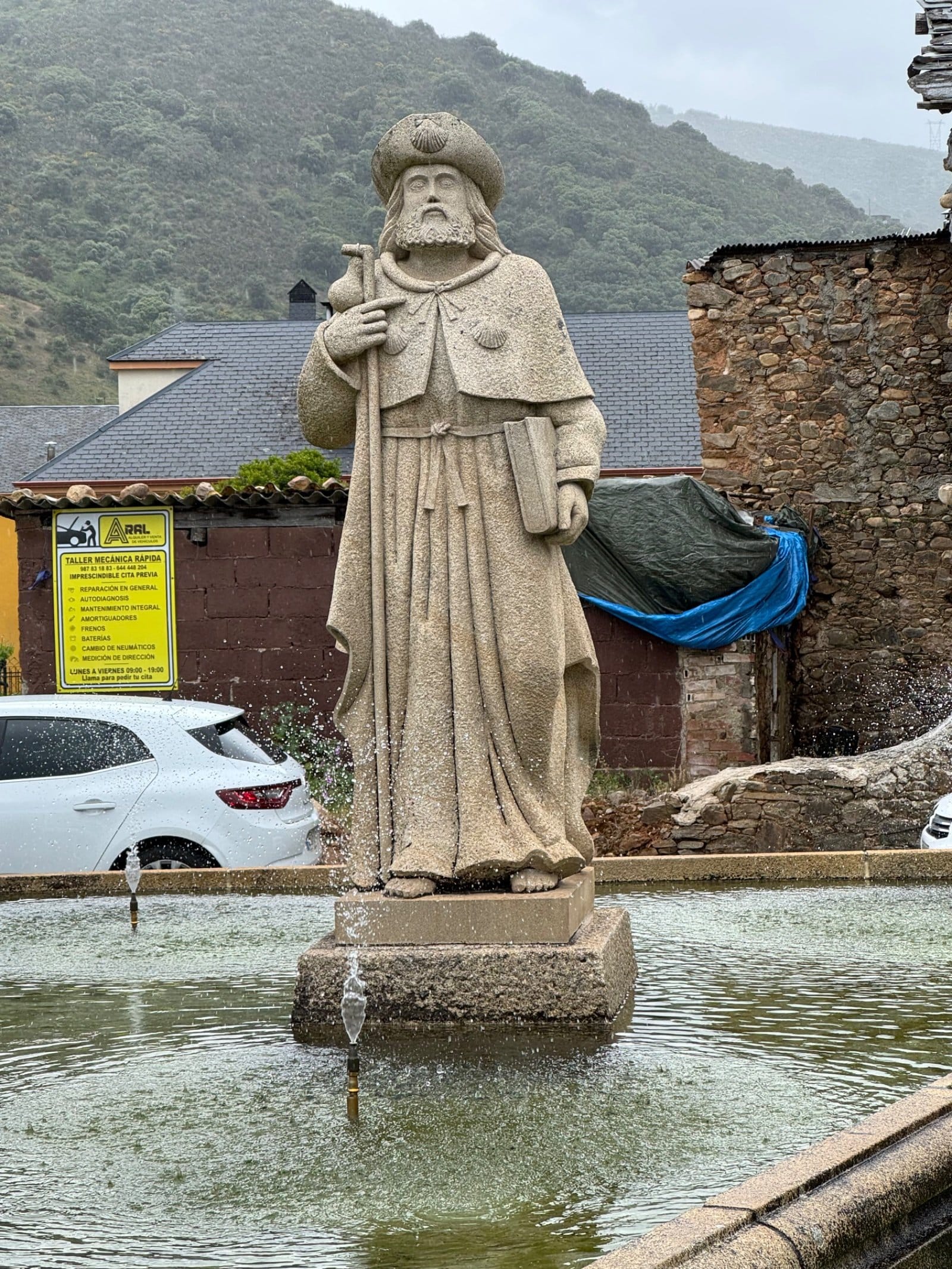 Santiago pilgrim statue fountain in Molinaseca
