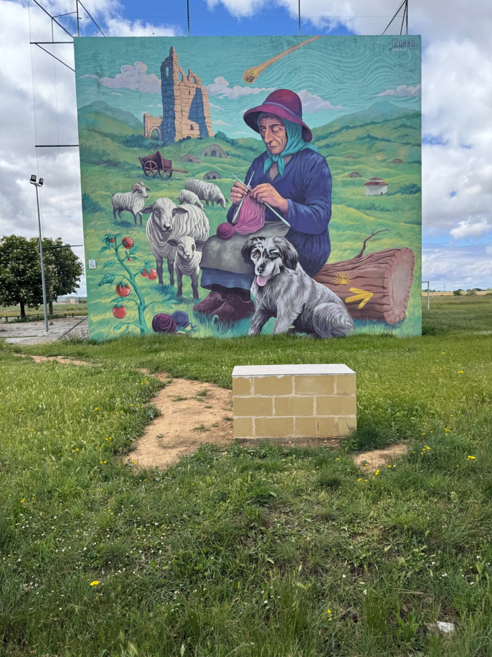 Shepherdess with sheep and ancient castle tower